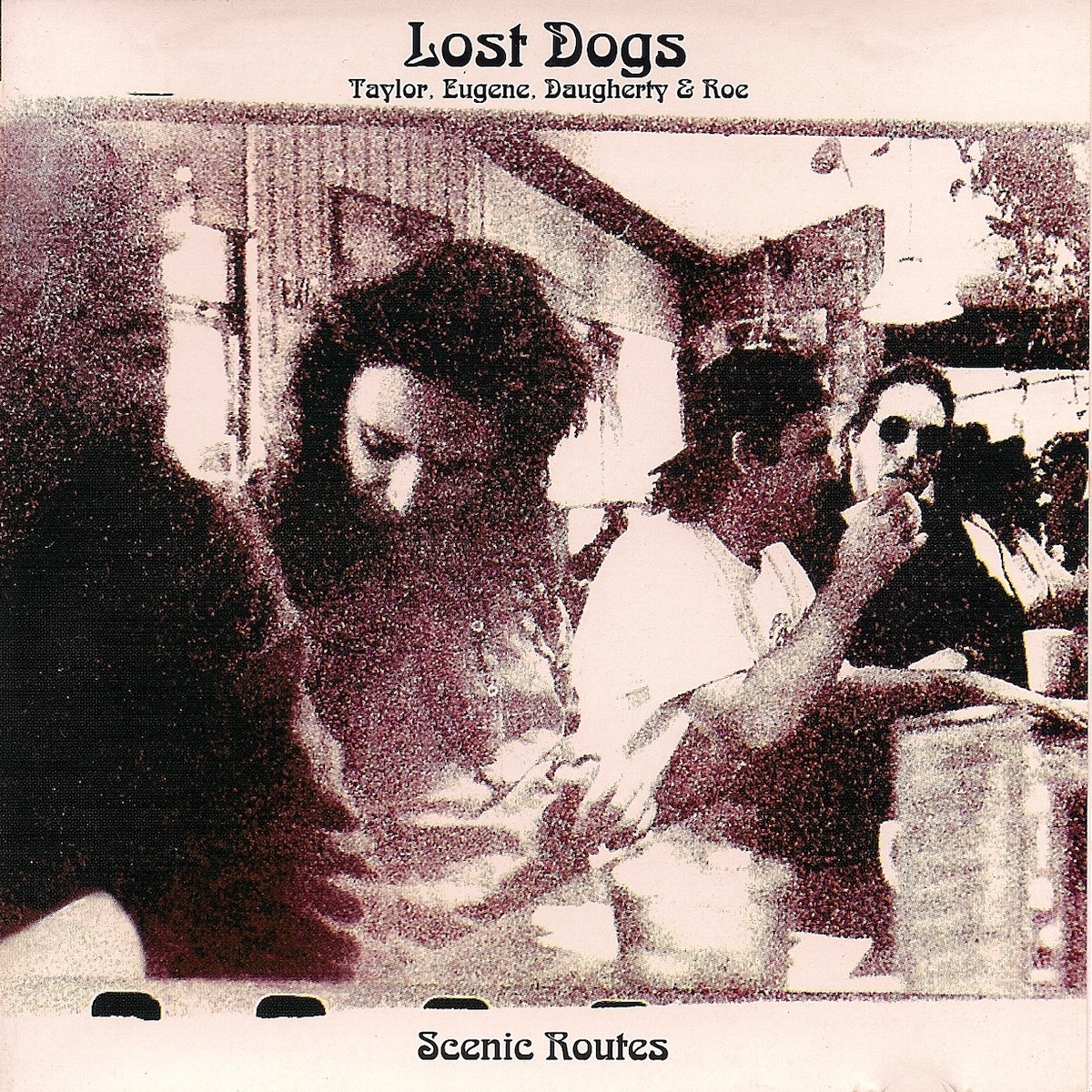 Album Art of The Lost Dogs's Scenic Routes album - On a white background, a grainy black-and-white photo of four men sitting at the counter at a diner or restaurant, it looks like maybe taken from a camera sitting on the counter. Most of the men are not looking at the camera and it seems like they are caught in the middle of life together, one about to drink from a mug and one looking down at his feet below the counter. The bottom edge of the film reel can be seen below the photo.</body></html>