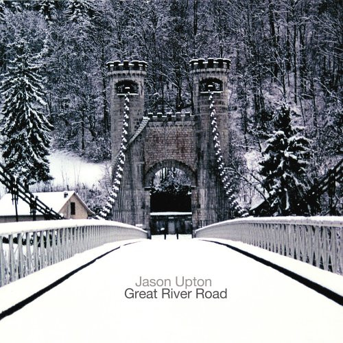 Album Art of Jason Upton's Great River Road album - A nearly black-and-white photo of a winter landscape, mostly snow-covered pine trees in the background. Also what looks like a house can be seen in the background to the left. The center of the photo is a snow-covered bridge going over an unseen river with railings on the sides and a large series of cables holding the bridge up.</body></html>