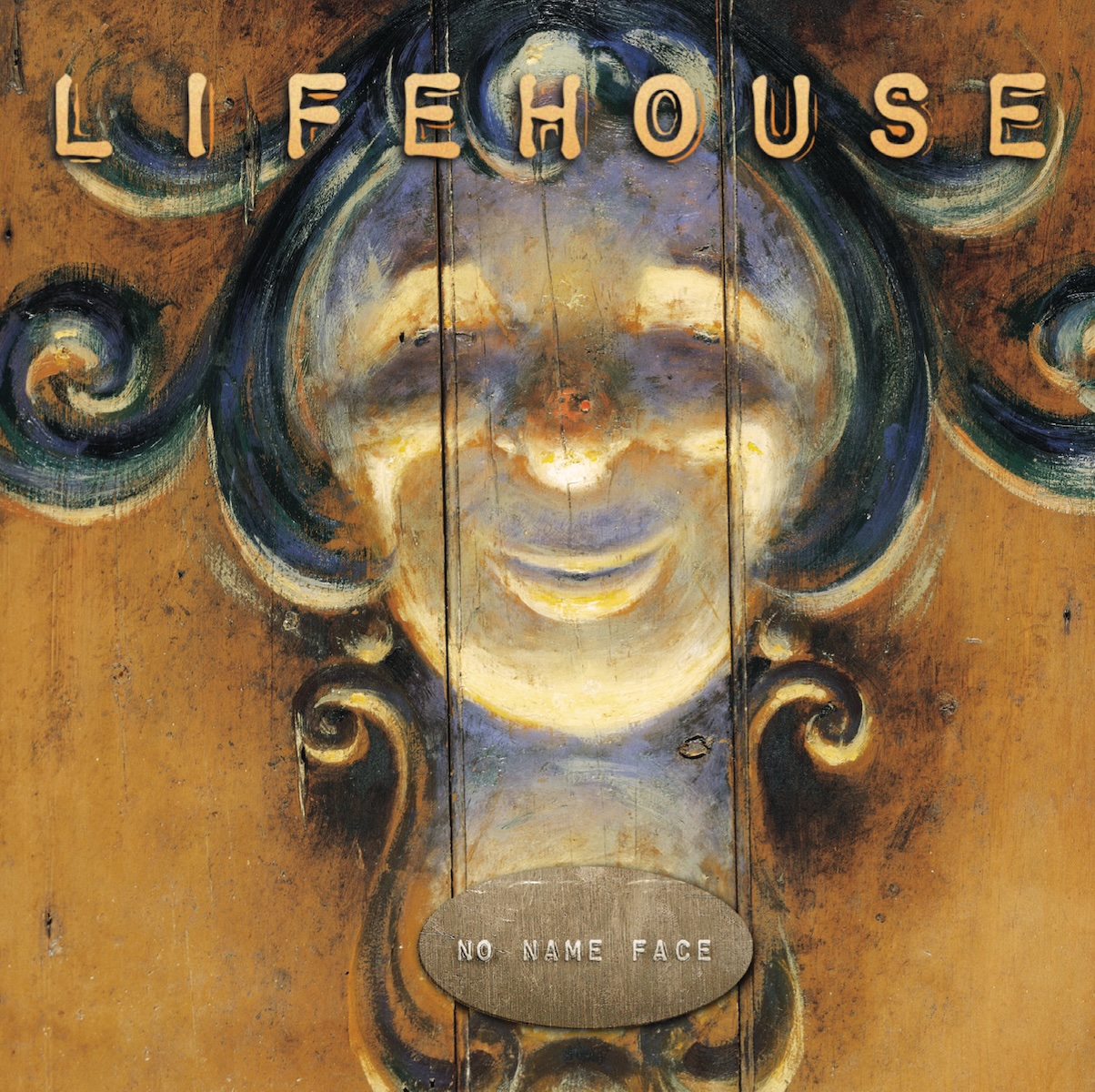 Album Art of Lifehouse's No Name Face album - A painting or a photo of a painted face, maybe found on some sort of carnival ride or something. The face is round and white and there's green/black curls on the top and sides that kinda look like hair, and also look like decorative, curly edges to an ornate design. Below the face is a plaque that has the album title stamped on it in small, uppercase print.</body></html>