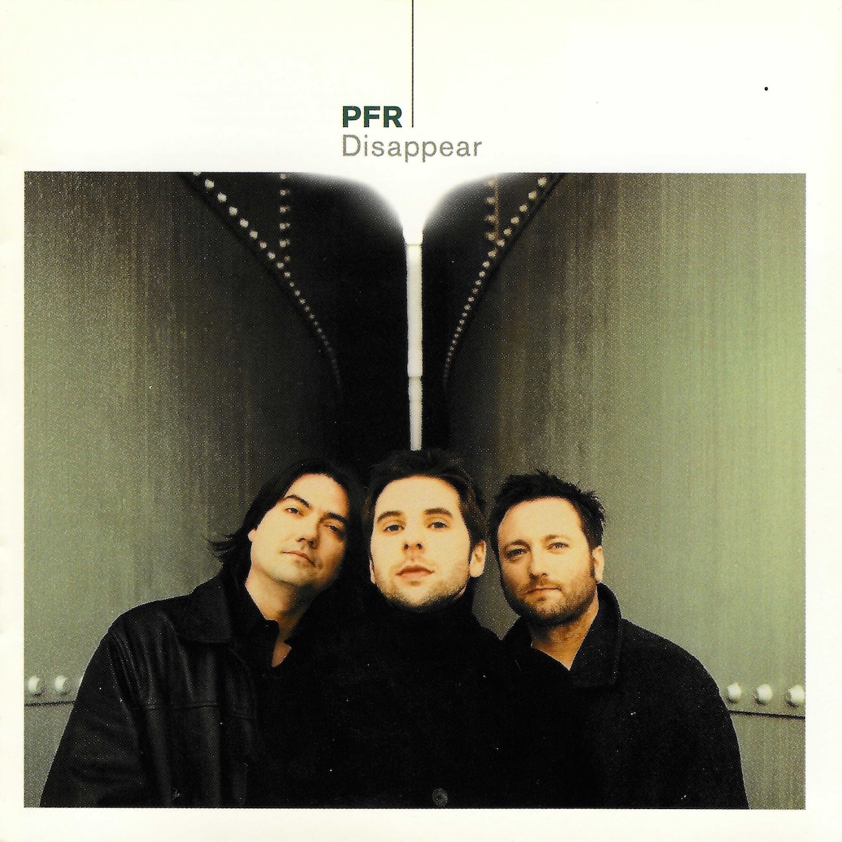 Album Art of PFR's Disappear album - On a creamy white background and border, the bottom three quarters is a color photo of three young men leaning into the middle of a camera frame and looking at the camera. They are flanked on both sides and stretching into the background by metal walls with a few lines of rivets, maybe like they're standing in between two large ship's hulls or something. The walls converge in the middle distance, and there's a bit of bright light there.</body></html>