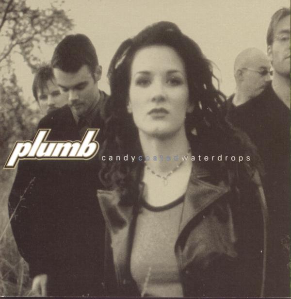 Album Art of Plumb's Candycoatedwaterdrops album - A photo of a dark-haired woman with a fitted tee and a leather jacket has four men behind her on the sides, half looking at the camera and half looking in other directions. They photo is black-and-white with the white parts being a gold-grey hue. Printed above the middle of the photo, to the left of the woman, is the band name in big, white letters.</body></html>
